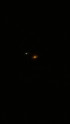 orange light in distance other planes out as well image 1