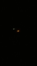 orange light in distance other planes out as well image 677