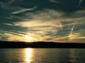 Bright circle in the sky at sunset Conesus Lake NY image 760