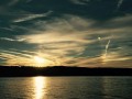 Bright circle in the sky at sunset Conesus Lake NY image 761
