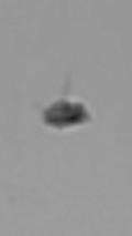 Disc shaped object photographed over beach image 809