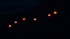 Circular lights seen reddish orangish image 1