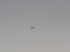 Military drone or a UFO high up in the sky image 1