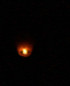 15-20 orange round lights moving east to west image 1