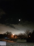 object seen above moon , picture taken with phone image 235