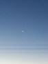 Bright Triangular Hovering Object Rising image 1