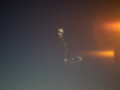 Bright light changes into crazy vapor trail image 382